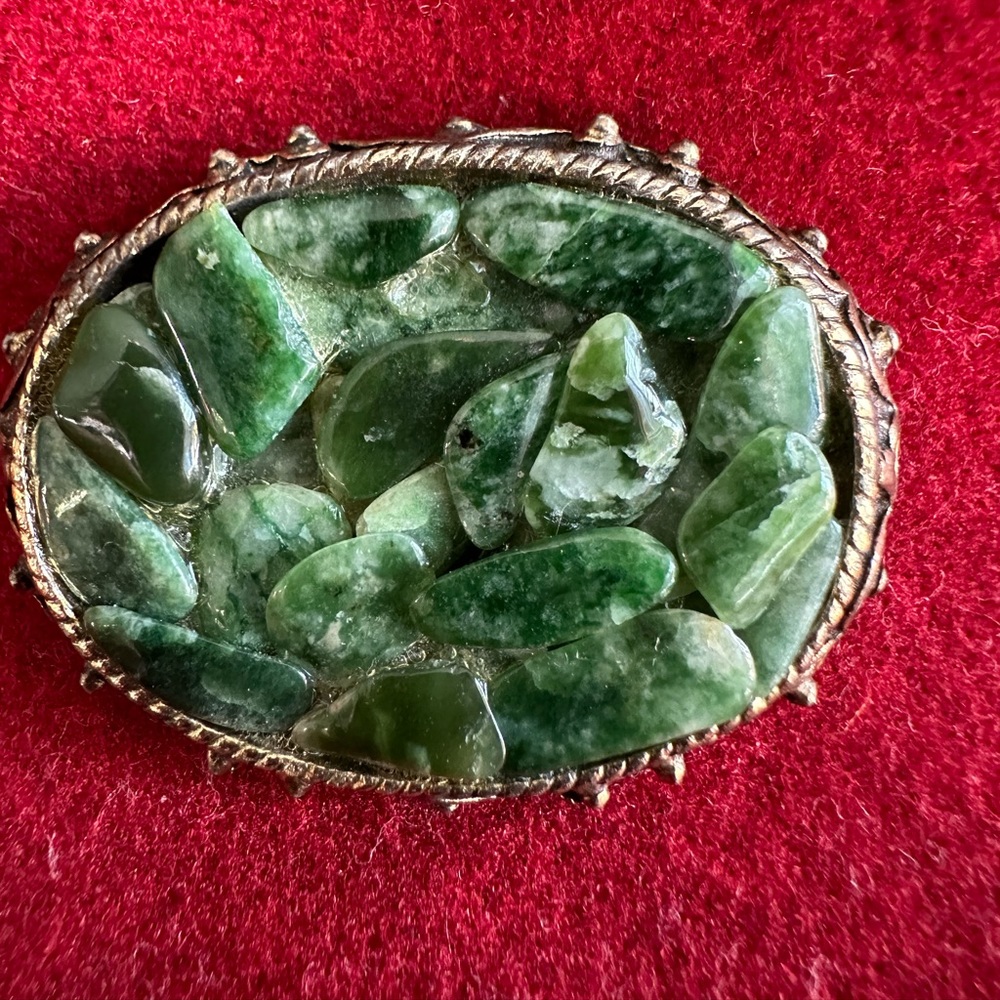 Stunning Vintage green stone brooch. Unsure of the age. Bold green beauty.